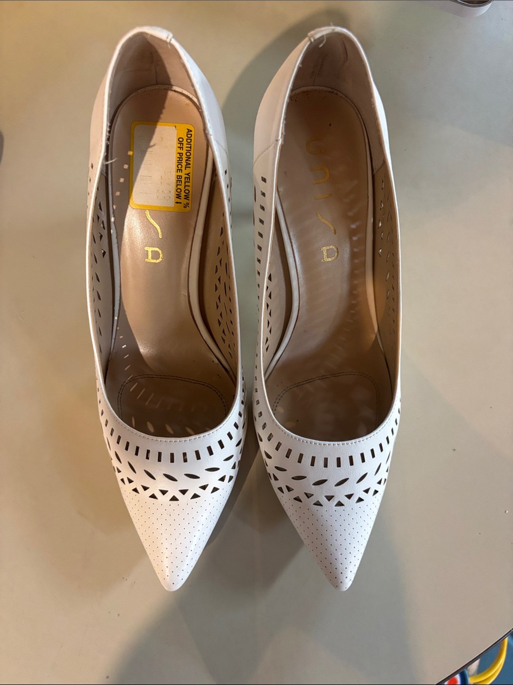 Unisa White Laser-Cut Pointed Toe Pumps